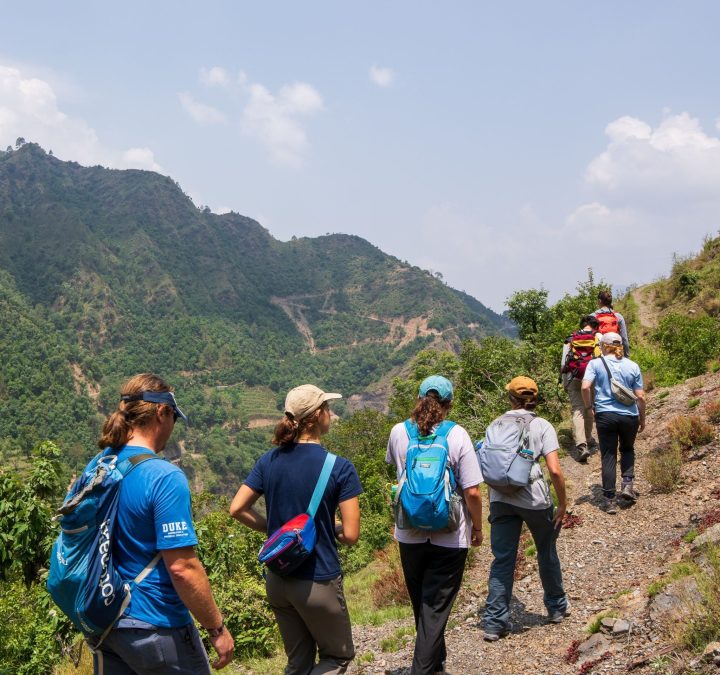 Duke University students and their Duke Outdoor Adventures trip leader hike along a mountain trail during the research expedition to the Gangotri Glacier in the Indian Himalayas.